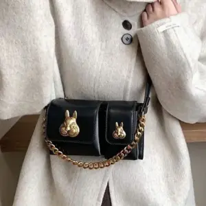 Women black baguette bag with squirrel accessory design elegant shoulder handbag