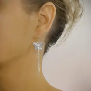 Rhodium plated butterfly dangle earrings with Zirconia